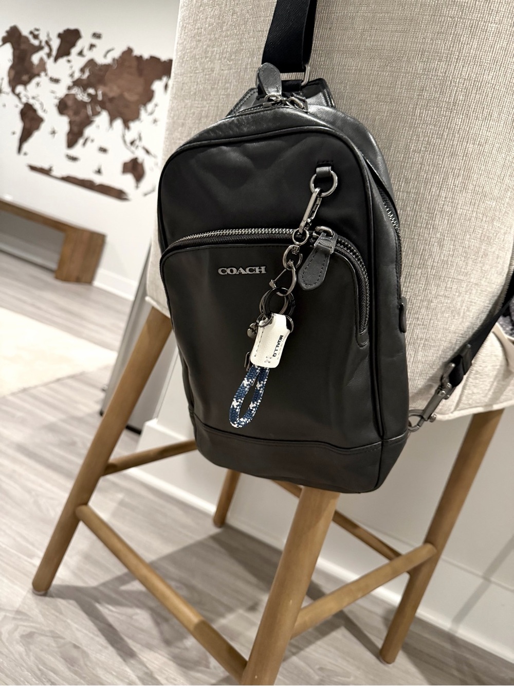 Coach Black Leather Crossbody Backpack with Key Charm